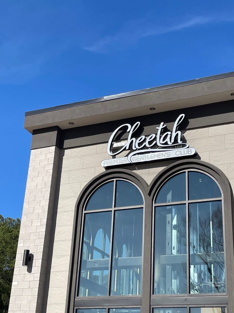 Cheetah Raleigh sign outside day
