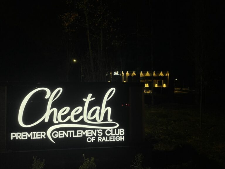 Cheetah outdoor sign night